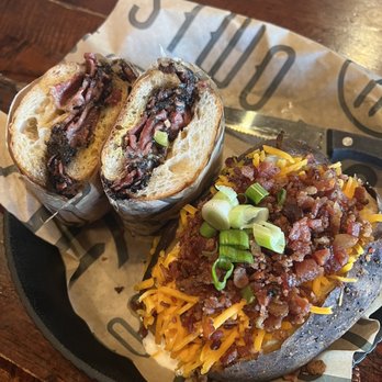 Westwoods BBQ and Spice Co. signature dishes Tri-Tip, Baby Back Ribs, Pulled Pork, Beef Brisket, various BBQ Sandwiches, Mac & Cheese.